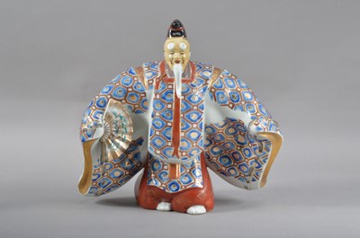 Lot 127 - An early  20th century Japanese Kutani hand painted porcelain figurine