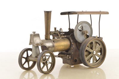 Lot 886 - Wilesco or similar traction engine, possibly a brass finish example