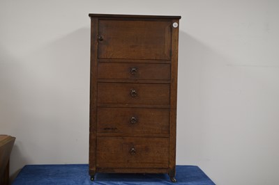 Lot 4 - A 19th Century mahogany bedside cupboard with four draws beneath