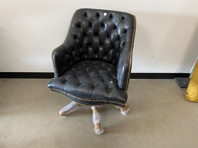 Lot 371 - A c1980s black leather upholstered swivel office chair