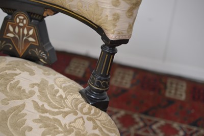 Lot 8 - A Victorian Aesthetic Movement nursing seat English circa 1870s