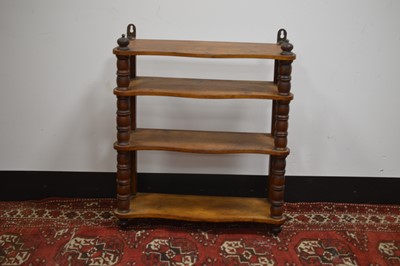 Lot 18 - A Victorian set of mahogany hanging wall shelves