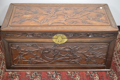 Lot 21 - A Chinese carved camphor wood chest