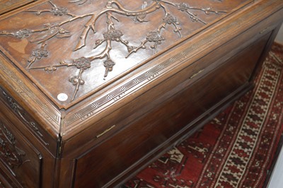 Lot 21 - A Chinese carved camphor wood chest