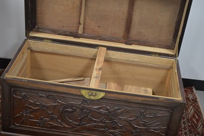 Lot 21 - A Chinese carved camphor wood chest