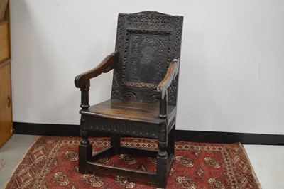 Lot 24 - A 17th  Century English oak wainscot armchair