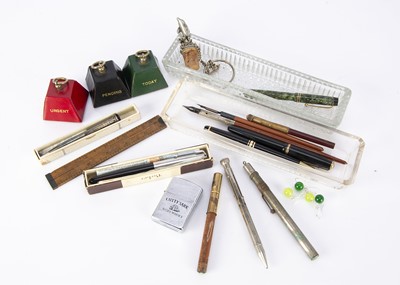 Lot 530 - A small collection of pens and related items
