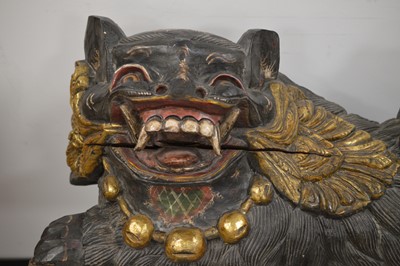 Lot 29 - A large vintage Oriental Chinese style carved gilt wood Foo Dog