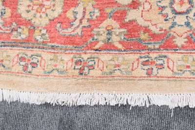 Lot 44 - An antique Turkish Ushak carpet with ivory coloured wool ground