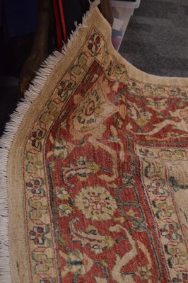 Lot 44 - An antique Turkish Ushak carpet with ivory coloured wool ground