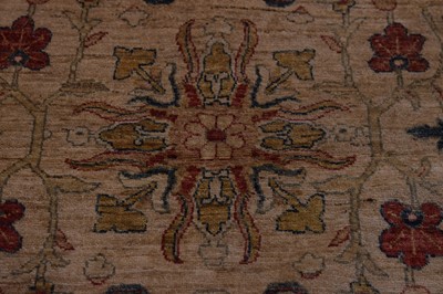 Lot 44 - An antique Turkish Ushak carpet with ivory coloured wool ground