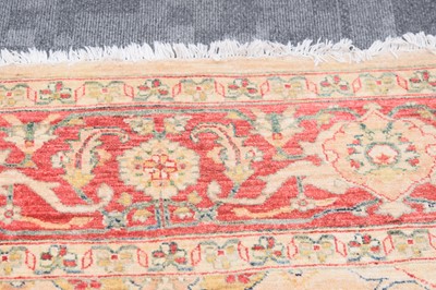 Lot 44 - An antique Turkish Ushak carpet with ivory coloured wool ground