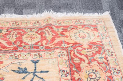 Lot 44 - An antique Turkish Ushak carpet with ivory coloured wool ground