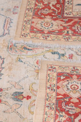 Lot 44 - An antique Turkish Ushak carpet with ivory coloured wool ground