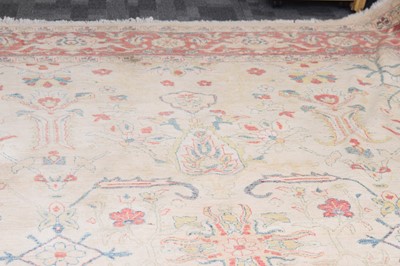 Lot 44 - An antique Turkish Ushak carpet with ivory coloured wool ground
