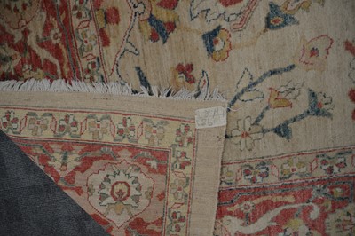 Lot 44 - An antique Turkish Ushak carpet with ivory coloured wool ground