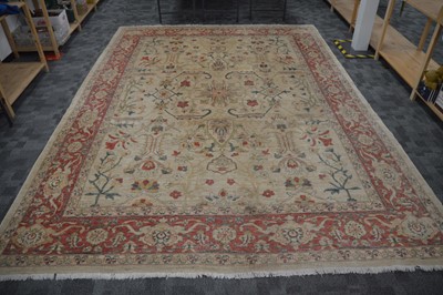 Lot 44 - An antique Turkish Ushak carpet with ivory coloured wool ground