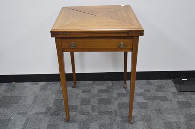 Lot 59 - An Edwardian mahogany envelope games or card table