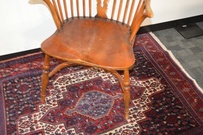 Lot 71 - An antique English elm and yew wood Windsor splatback arm chair