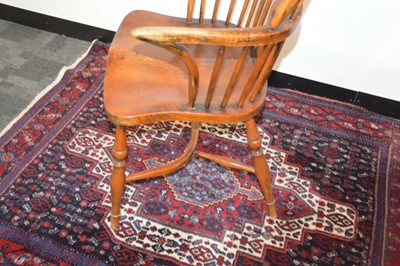 Lot 71 - An antique English elm and yew wood Windsor splatback arm chair