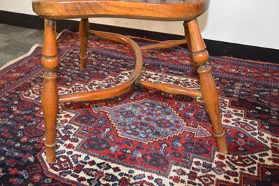 Lot 71 - An antique English elm and yew wood Windsor splatback arm chair