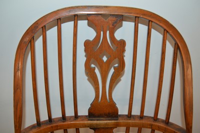 Lot 71 - An antique English elm and yew wood Windsor splatback arm chair
