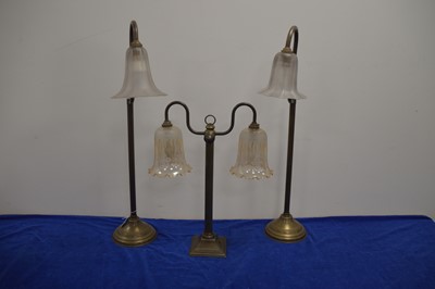 Lot 75 - A pair of brass table lights