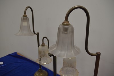 Lot 75 - A pair of brass table lights