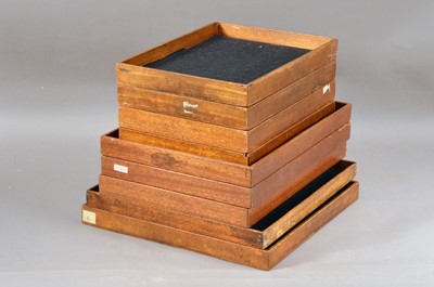 Lot 533 - A set of four light wood safe trays