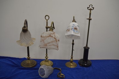 Lot 76 - Four Victorian and later brass table lamps