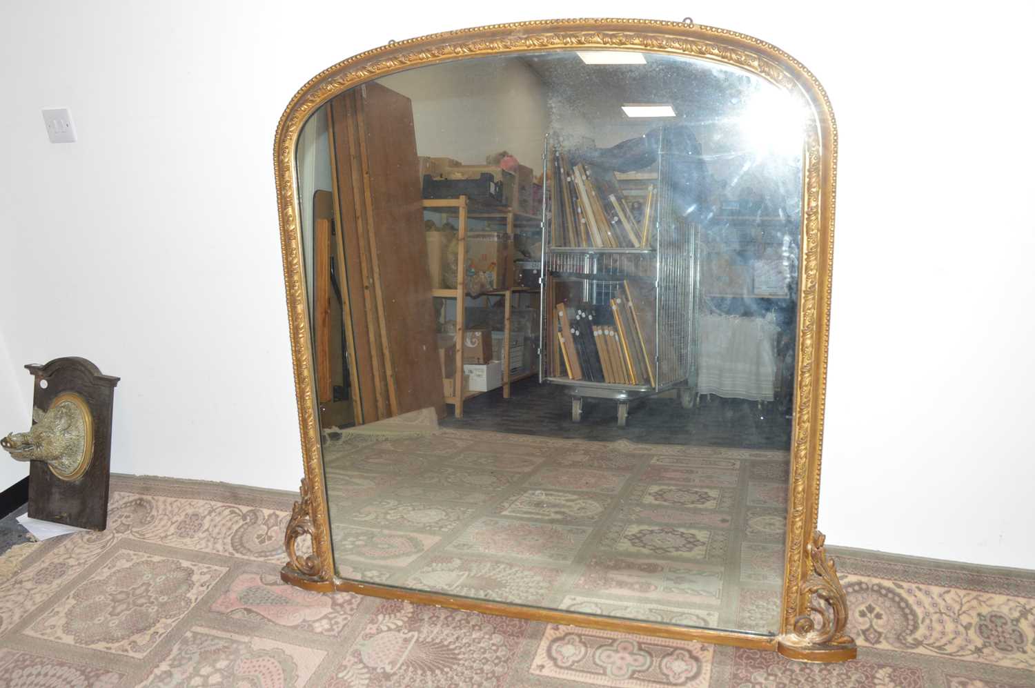 Lot 101 - A large Victorian overmantle mirror
