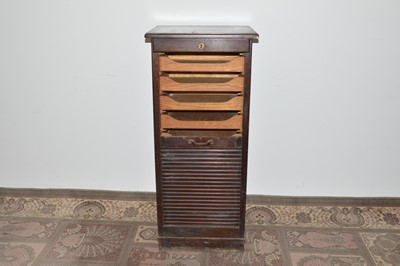 Lot 109 - An Art Deco period stained beech tambour front office unit by Cooke's