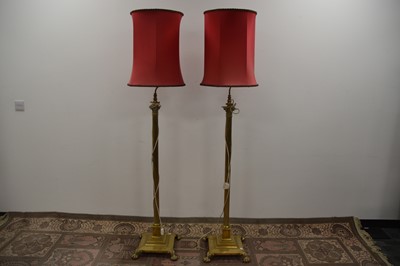 Lot 124 - A pair of Edwardian brass Corinthian column telescopic library standard lamps