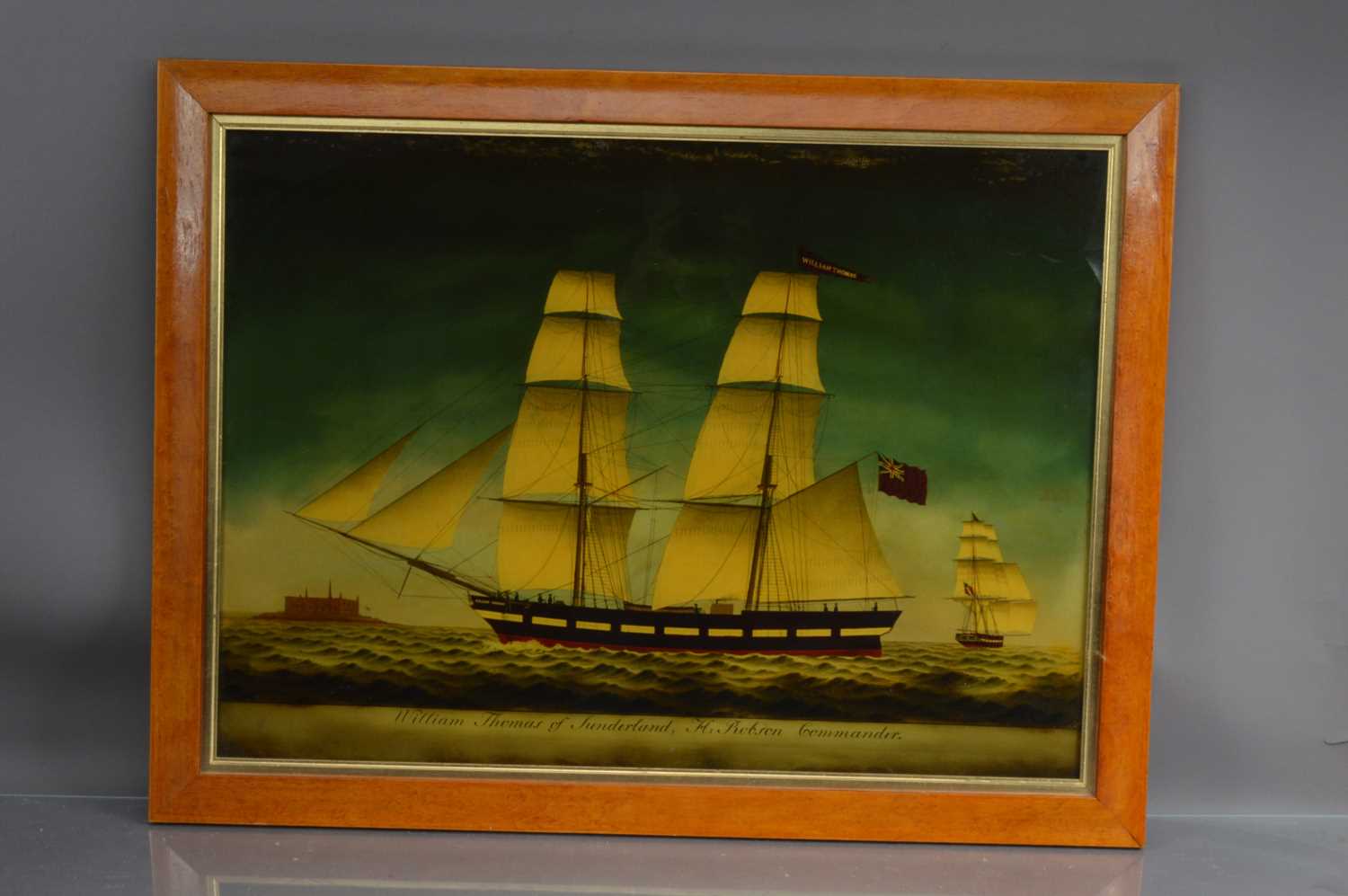 Lot 201 - British School reverse glass print "William Thomas of Sunderland - H Robson Commander"