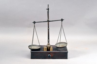 Lot 549 - A 19th century set of brass and wooden scales