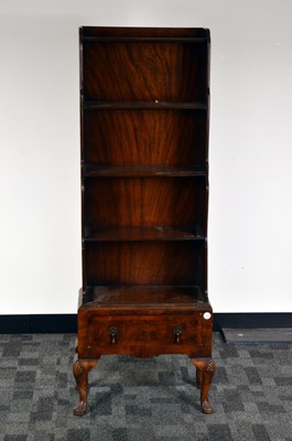 Lot 552 - A walnut Queen Anne style waterfall fronted bookcase