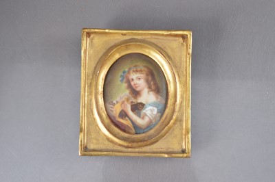 Lot 315 - A gilt framed miniature of a girl with a cat