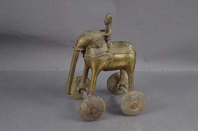 Lot 342 - An Indian temple toy in the form of an elephant and mahout on wheels