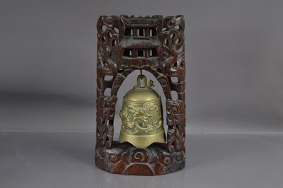 Lot 345 - A Chinese brass bell or gong with a dragon chasing a flaming pearl