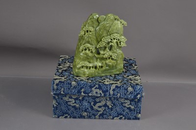 Lot 347 - A modern Chinese green jadeite carving of a mountain scene