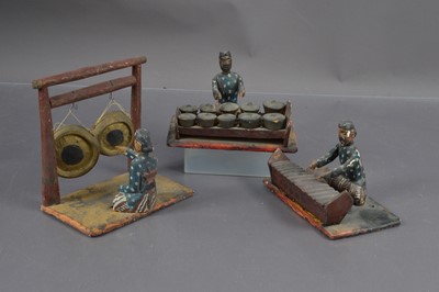 Lot 363 - An interesting painted and carved wood model of a gamelan musical ensemble