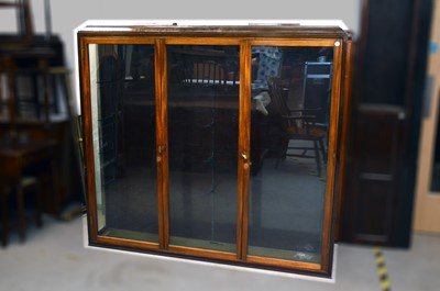 Lot 560 - An Edwardian and later mahogany triple display cabinet