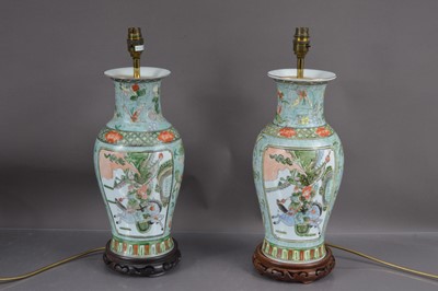 Lot 370 - A pair of Chinese famille vert vase-shaped porcelain table lamps