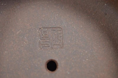 Lot 380 - A Chinese Yixing clay teapot with articulated dragon lid
