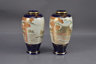 Lot 384 - A pair of Japanese Meiji period Satsuma style earthenware vases