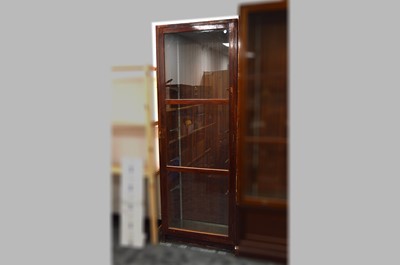 Lot 562 - A narrow wooden framed glazed shop display cabinet