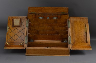 Lot 398 - A good late 19th or Early 20th Century oak desktop stationary cabinet or writing box