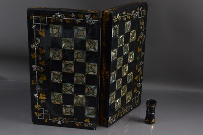 Lot 408 - A mid-19th Century black lacquer and abalone shell inlaid games board