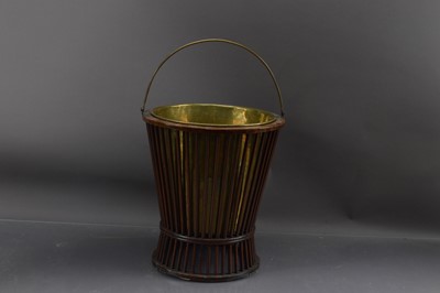 Lot 410 - An unusual 19th Century mahogany cage work brass lined peat bucket