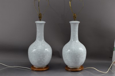 Lot 413 - A good pair of large Chinoiserie porcelain table lamps